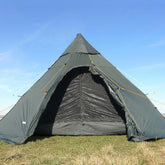 DD Superlight Tipi Tent set up outdoors, showcasing its lightweight and spacious design for camping.